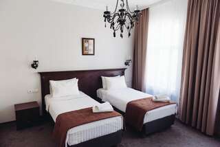 Отель Biplan City Даугавпилс Двухместный номер с 1 кроватью или 2 отдельными кроватями-1